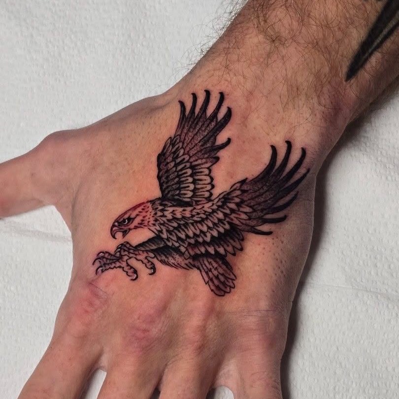 Eagle black and grey tattoo on the hand by Aaron Dor