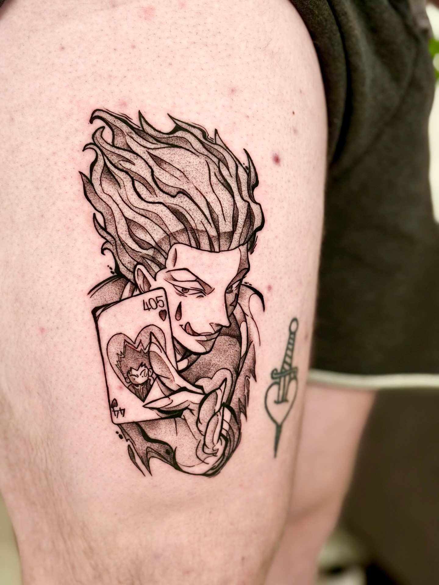 Joker card character dotwork tattoo on the thigh by Quinn ᶻ 𝗓 𐰁 .ᐟ, Charlotte, North Carolina