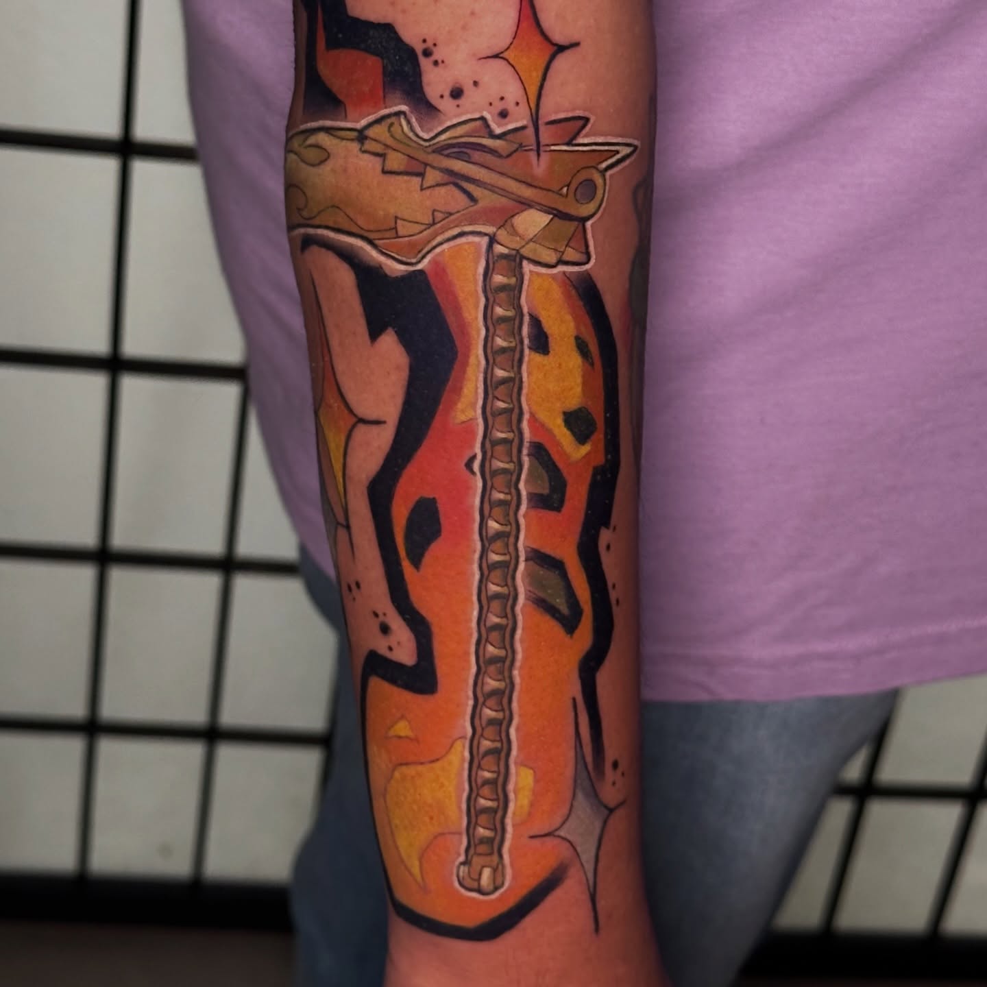 Spine American traditional tattoo on the forearm by Robert Douglas