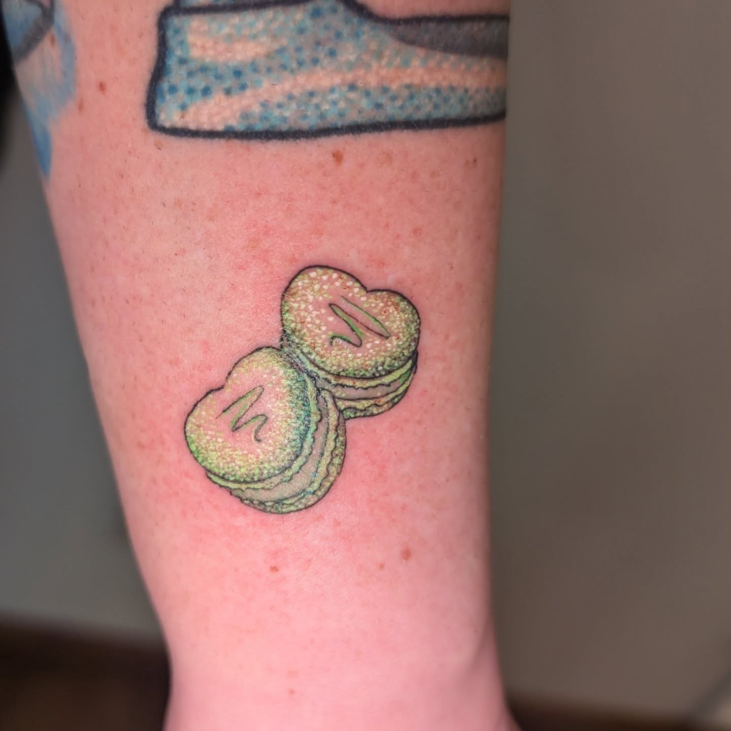 Macarons dotwork tattoo on the forearm by Arminda Walborn