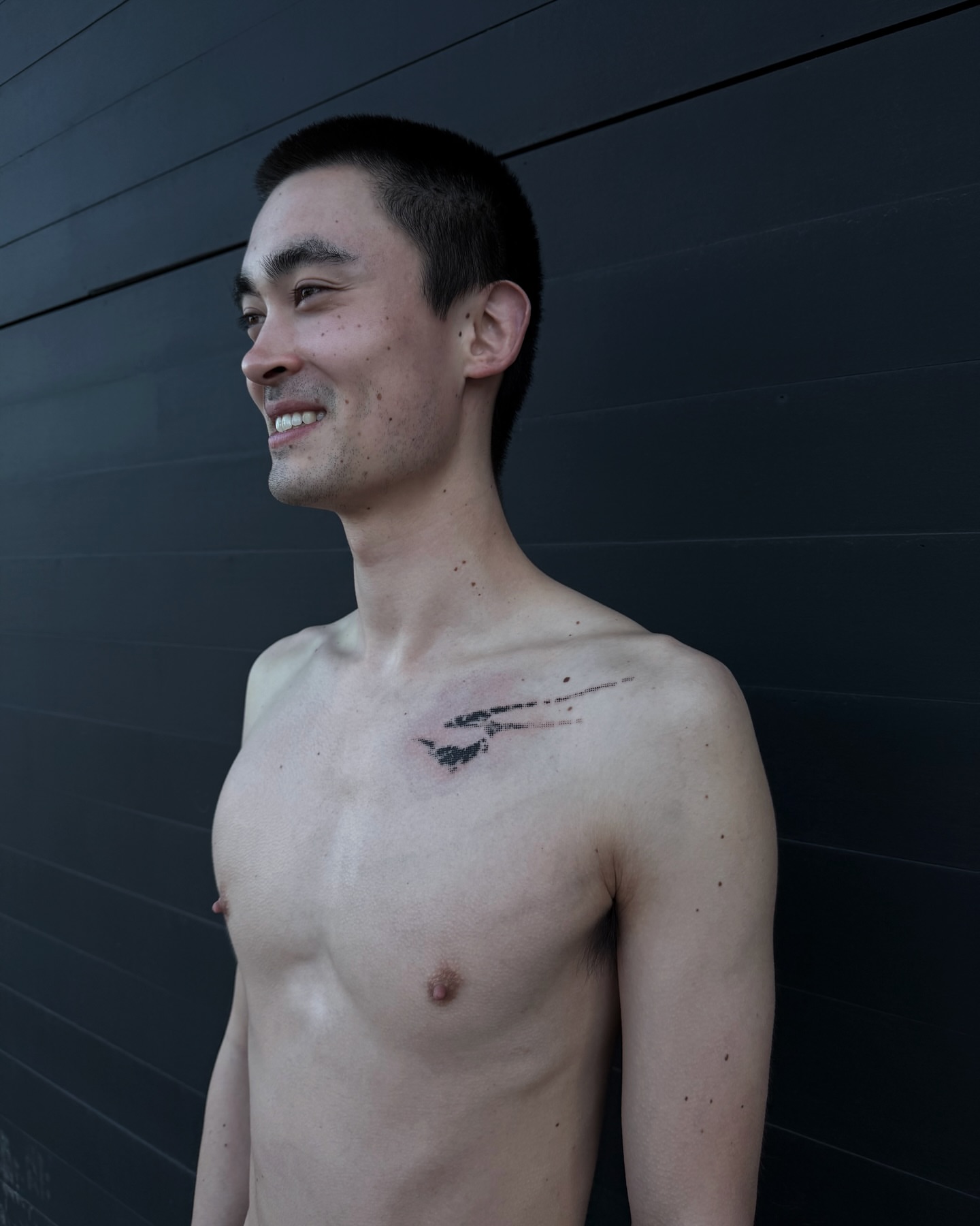 Arrow black and grey tattoo on the chest by Haza