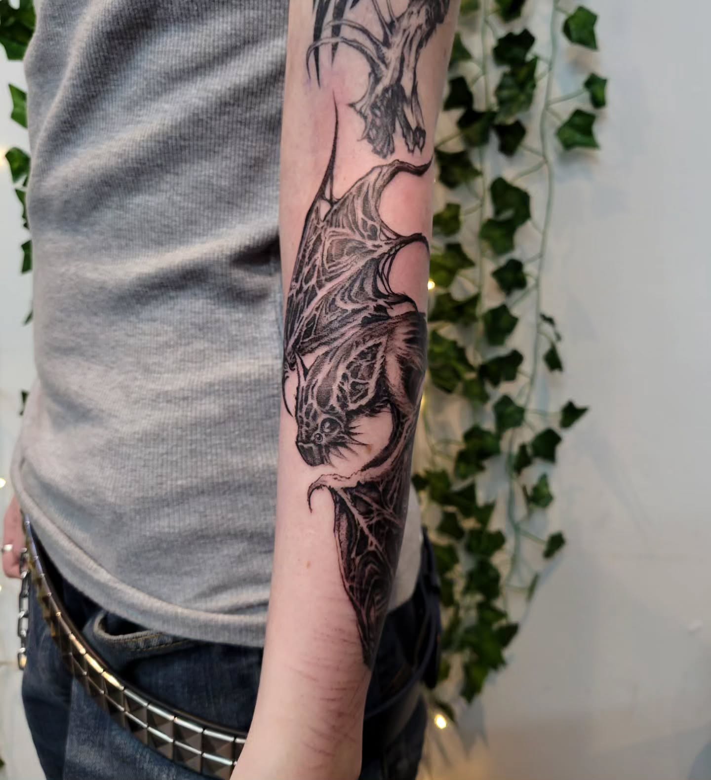 Dragon realism tattoo on the forearm by Uku Tattoos, Cambridge, England