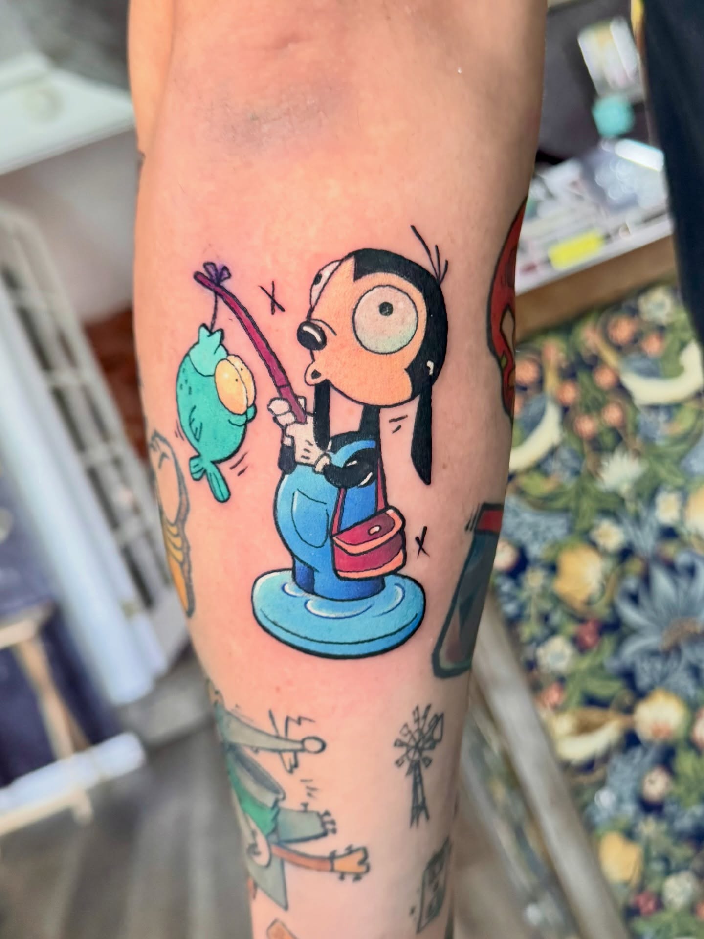 Dilbert character American traditional tattoo on the forearm by Joey Topacio