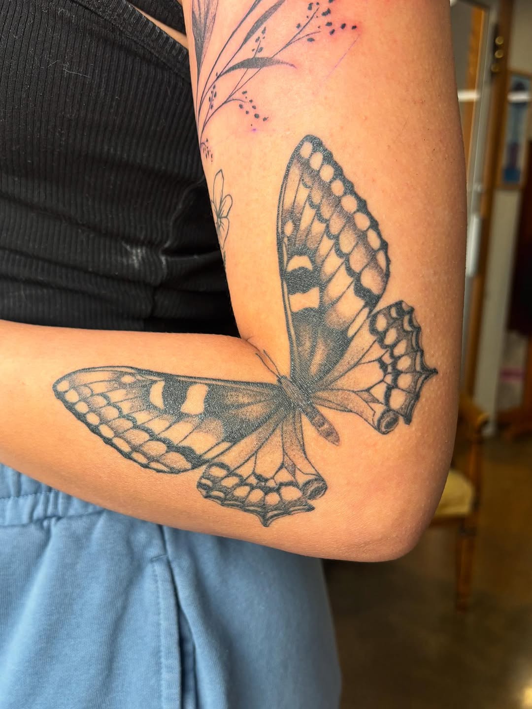Butterfly fine line tattoo on the forearm by Anna Kathleen, Des Moines, Iowa