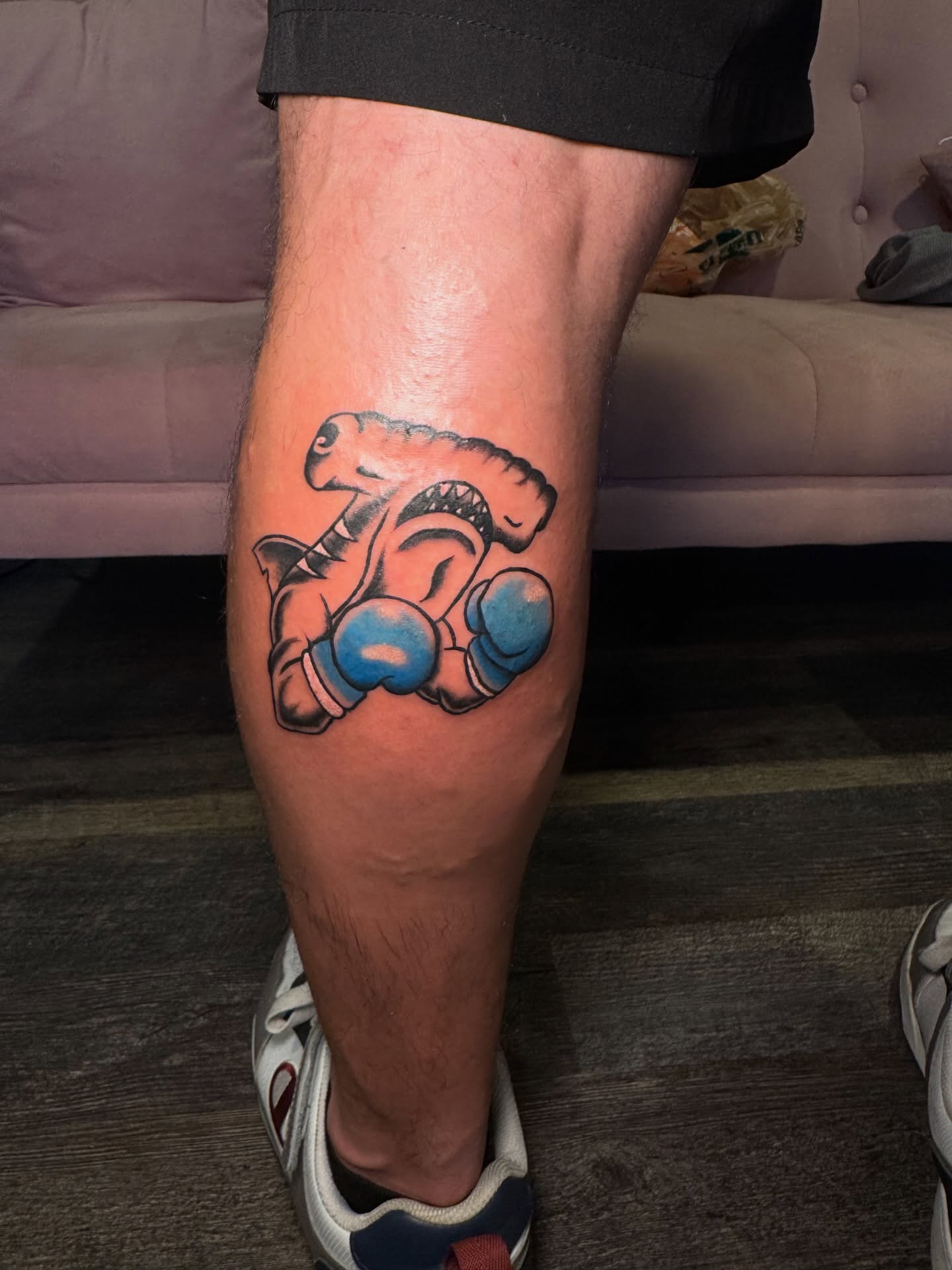 Robot American traditional tattoo on the calf by Kinzi Brown