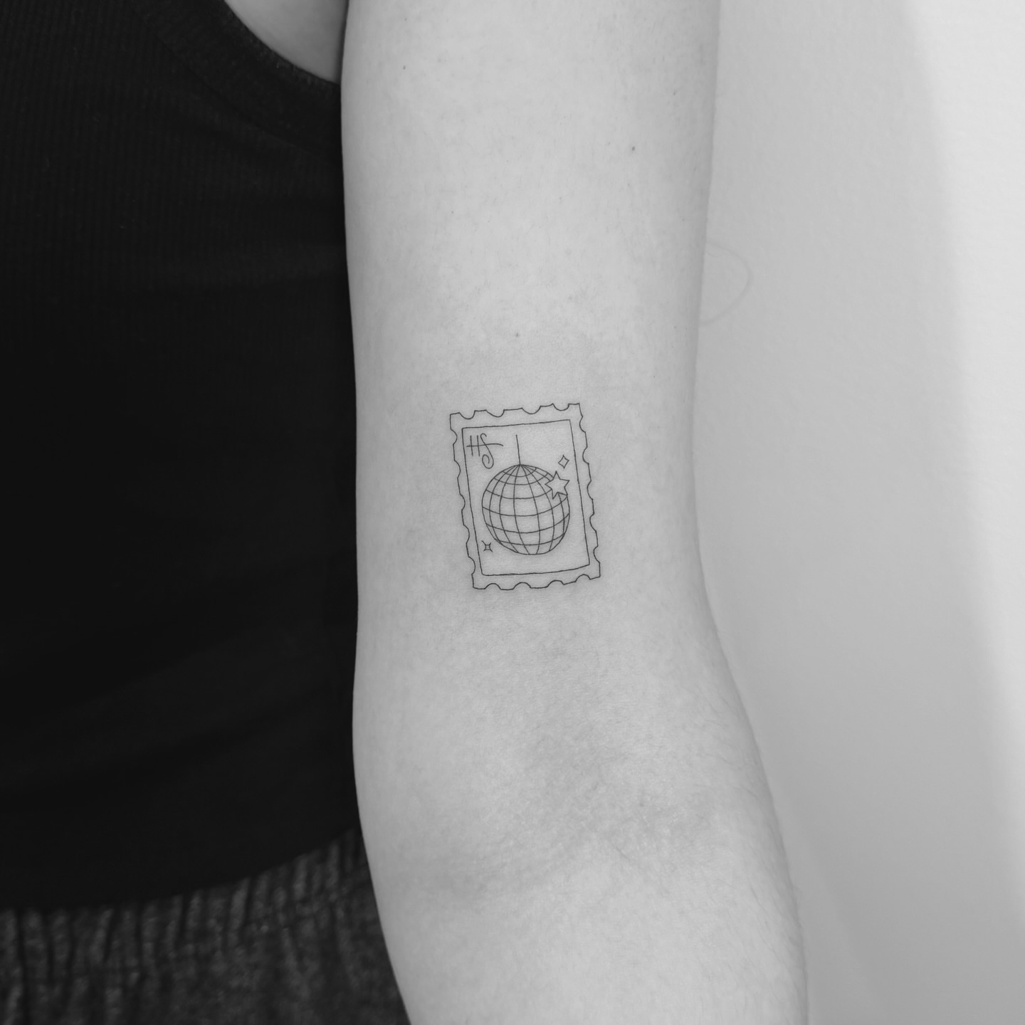 Postage stamp fine line tattoo on the forearm by Jessica, Cheektowaga, New York