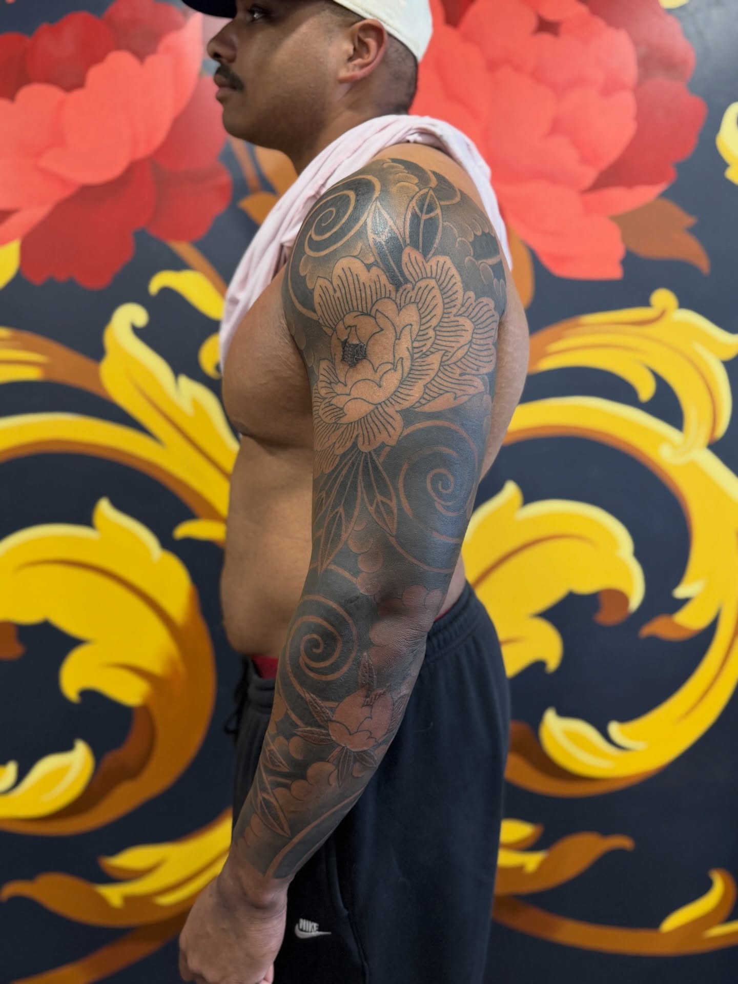 Floral design black and grey tattoo on the upper arm by Christopher  Cousins, Nashville, Tennessee