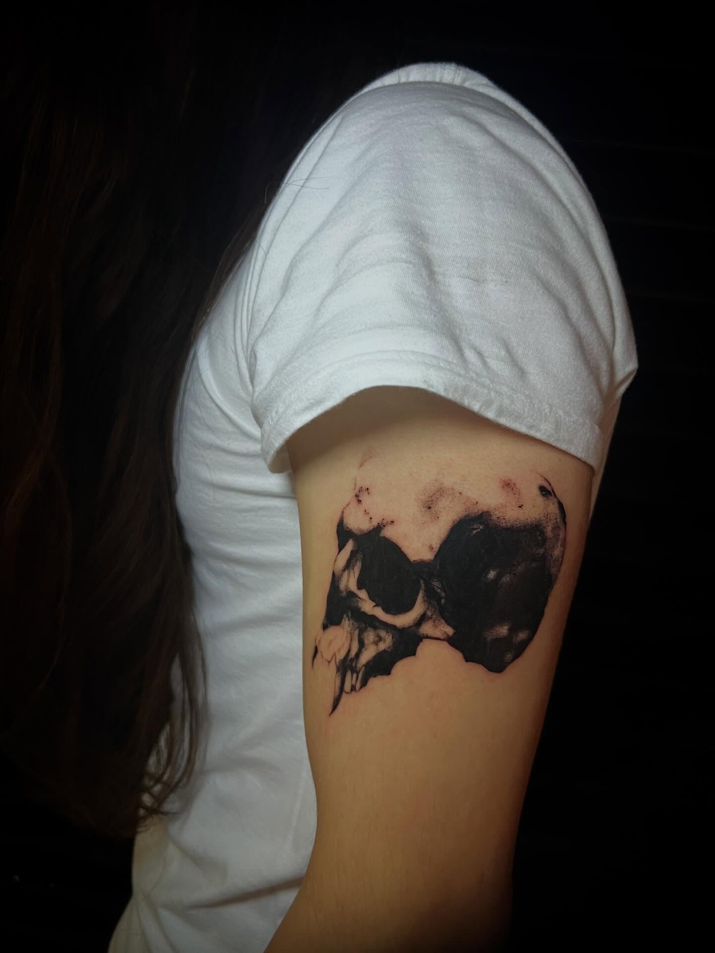 Skull black and grey tattoo on the forearm by @halfwit__