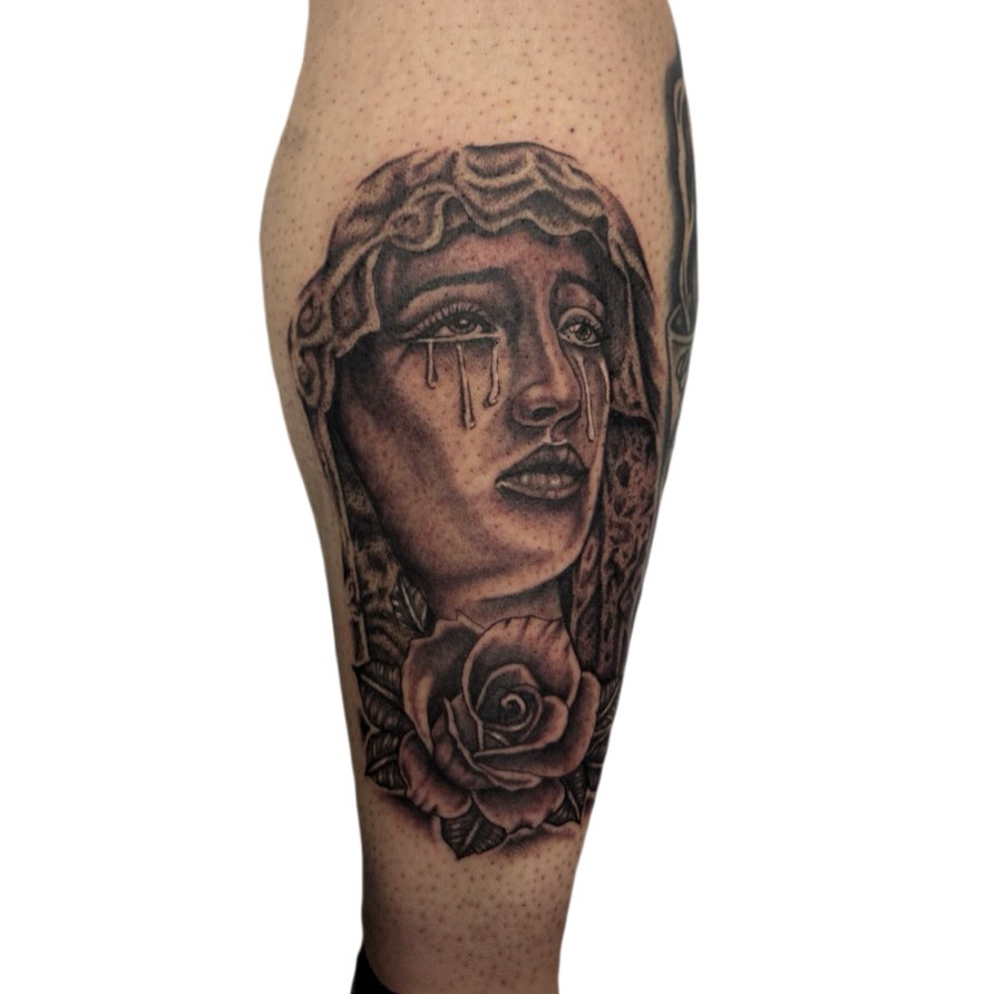 Weeping woman realism tattoo on the forearm by Ava Brady Tattoos