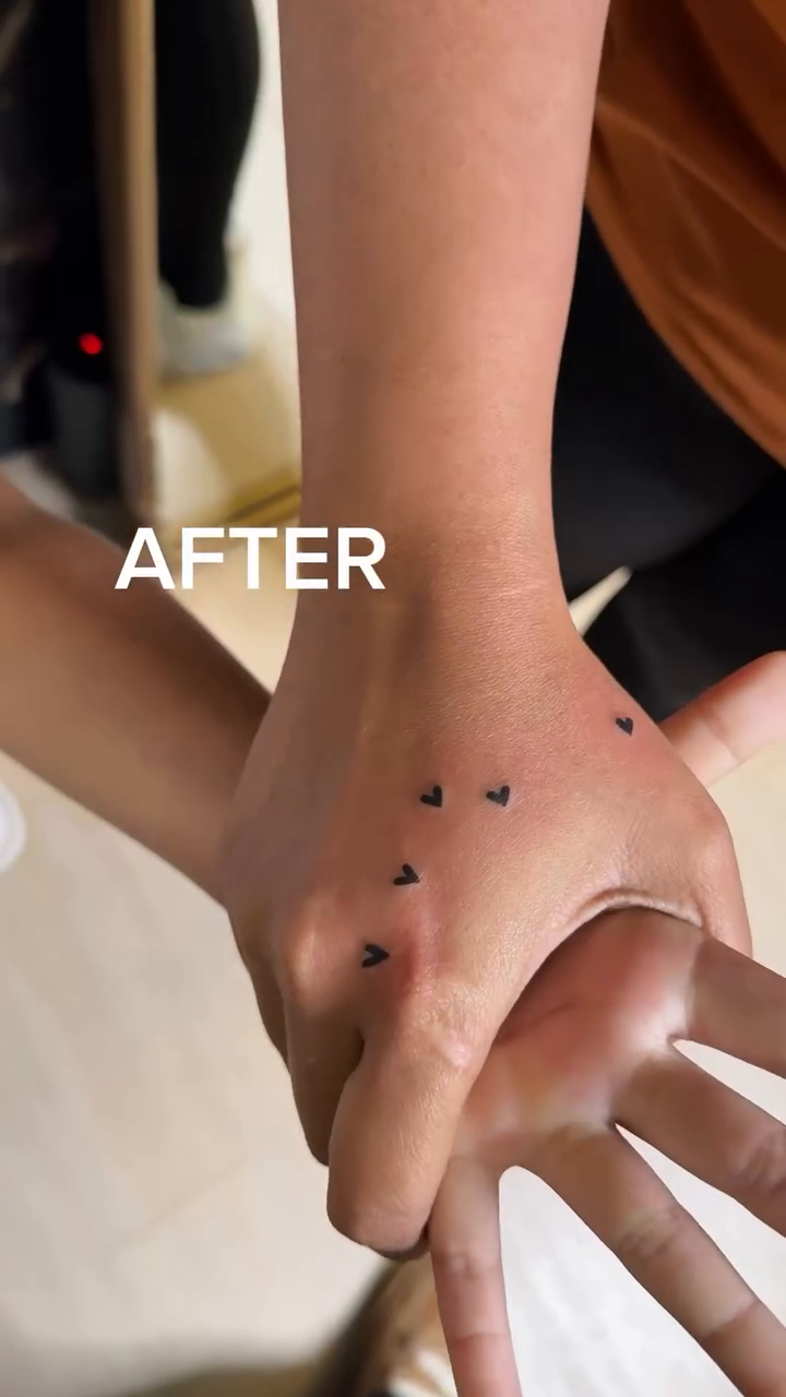 Small hearts on hand minimalist tattoo on the hand by Fineline Tattoos π€ Hailey L.