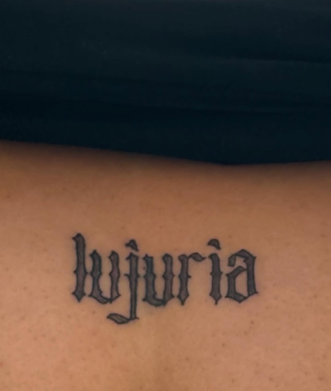 Word tattoo Chicano tattoo on the chest by ART