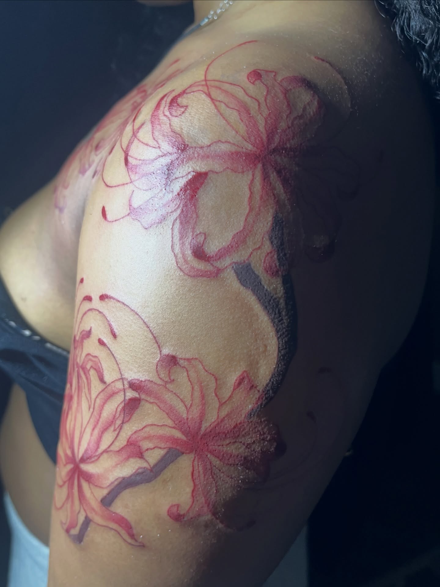 Lily flowers watercolor tattoo on the shoulder by Tam💟👩🏽‍🎨