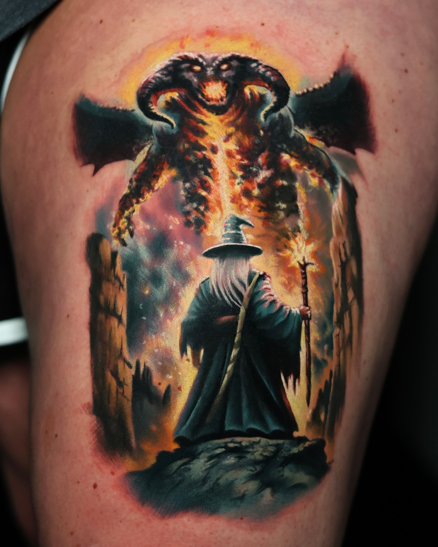 Wizard and demon dark realism tattoo on the thigh by Inexor tattoos
