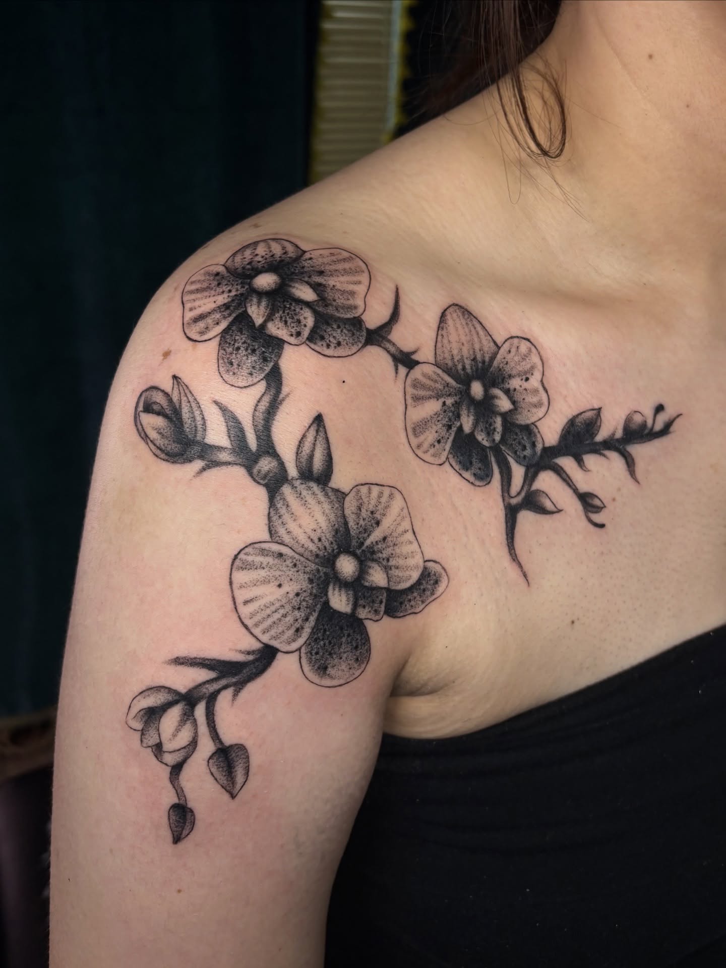 Orchids dotwork tattoo on the shoulder by Flor, Dallas, Texas