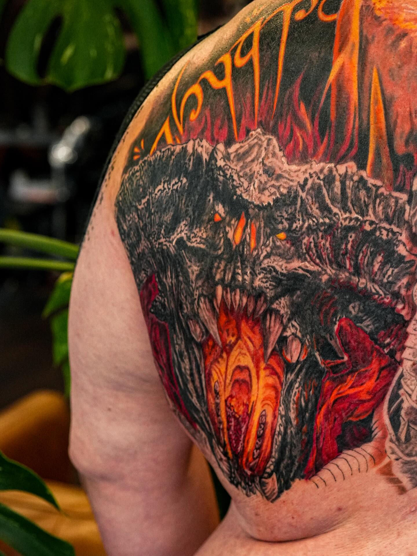 Volcano eruption realism tattoo on the shoulder by Simon Pouliot