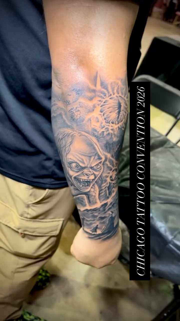 Skull and floral sleeve tattoo surrealism tattoo on the upper arm by Yulia Chekir, Chicago, Illinois