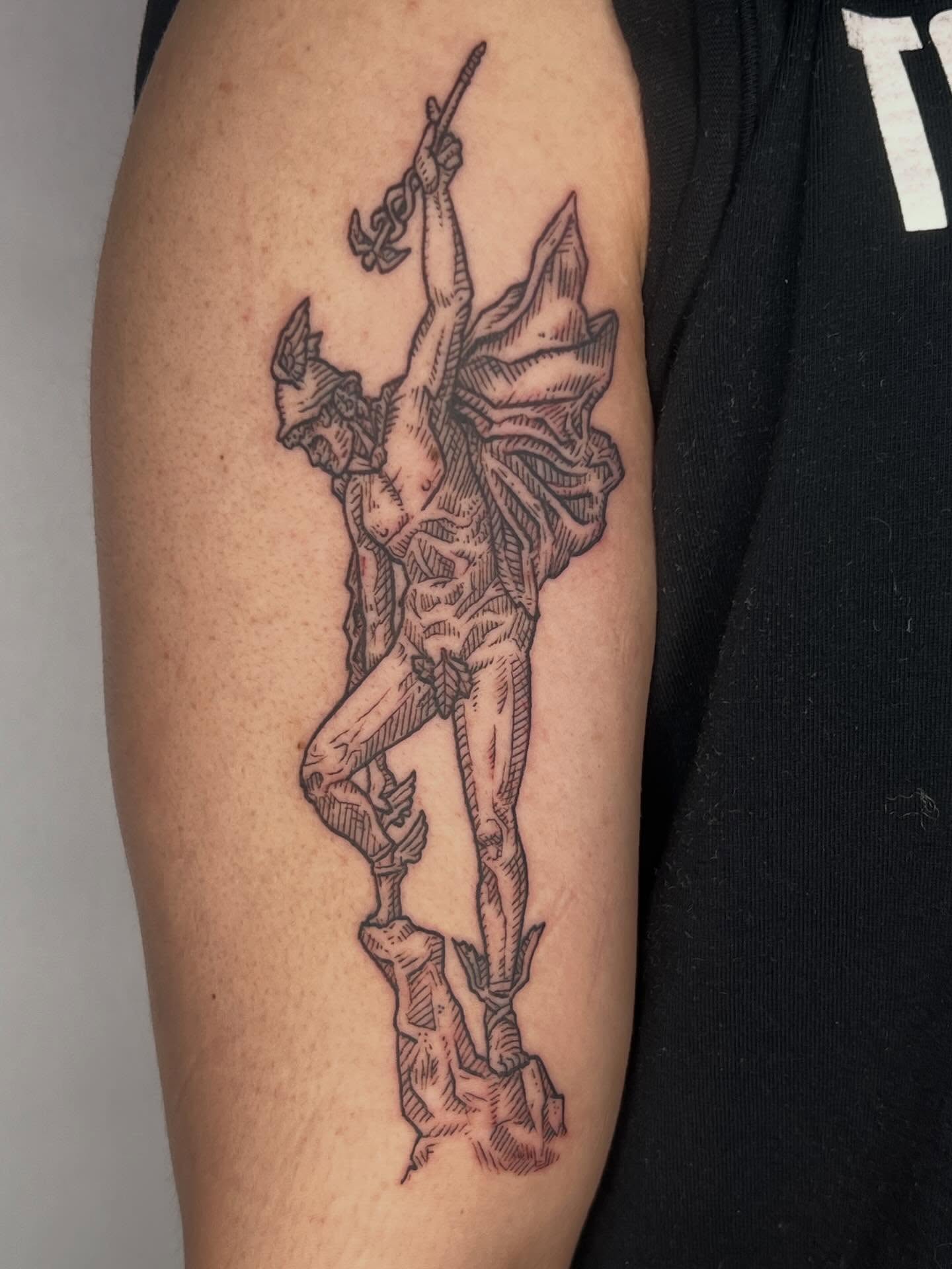Warrior black and grey tattoo on the forearm by Jason Middelton