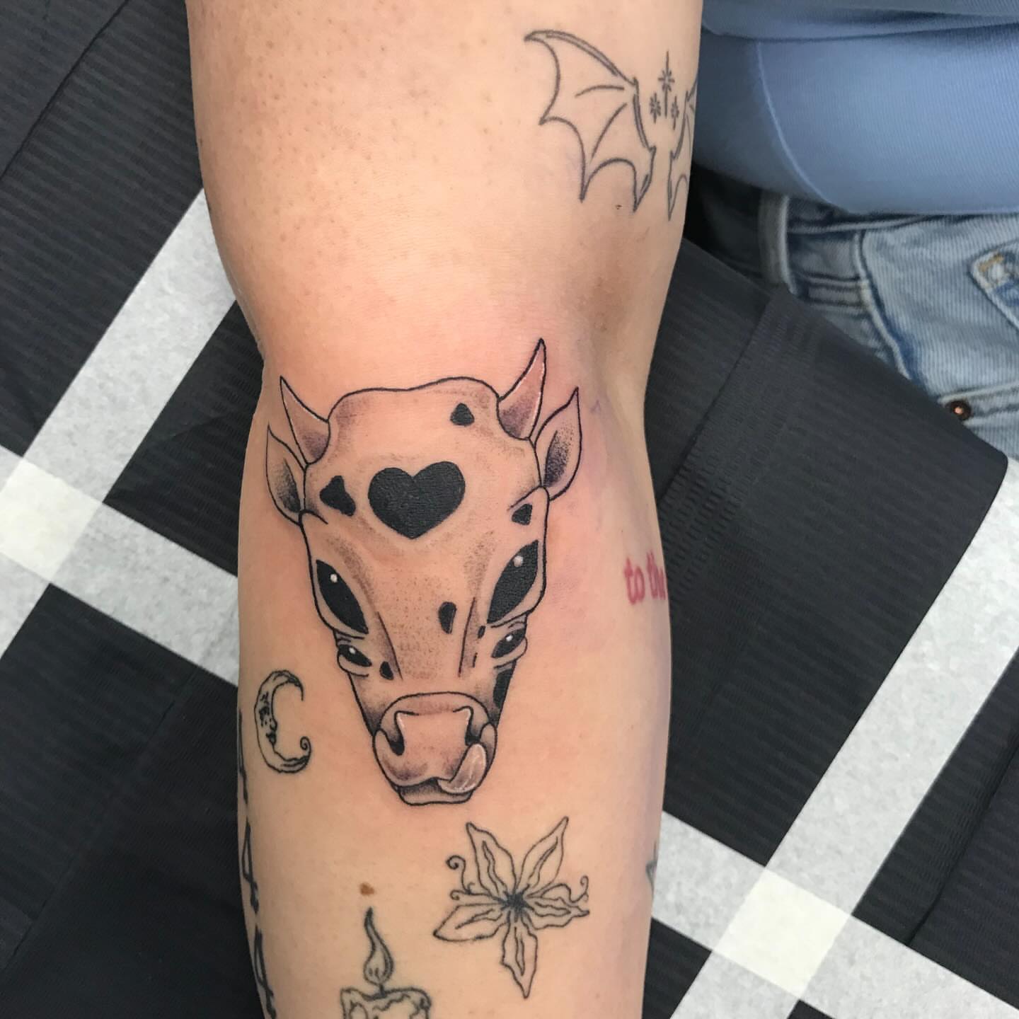Cow head realism tattoo on the forearm by @artinjections667