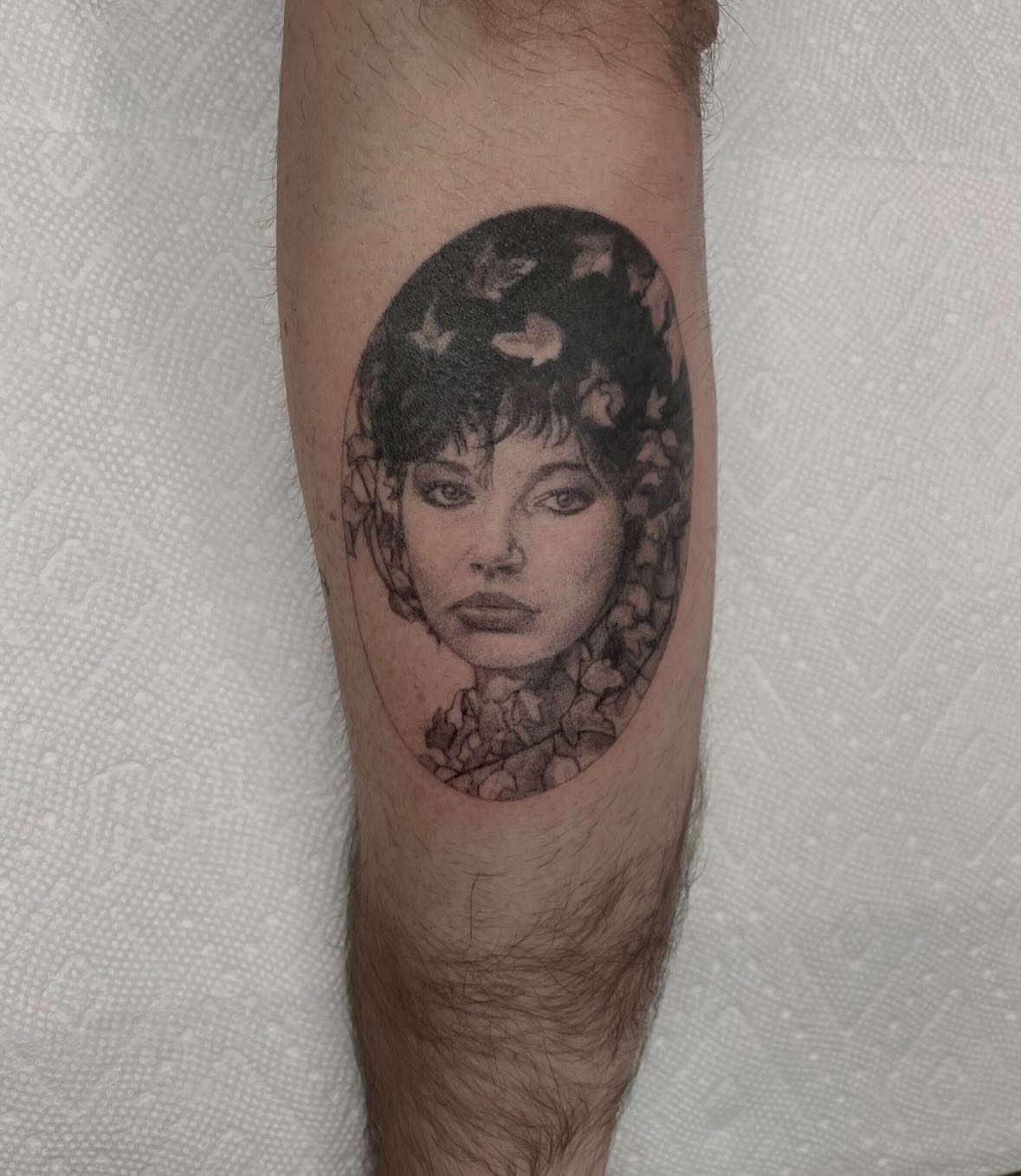 Portrait dotwork tattoo on the forearm by Dylan Coverdale