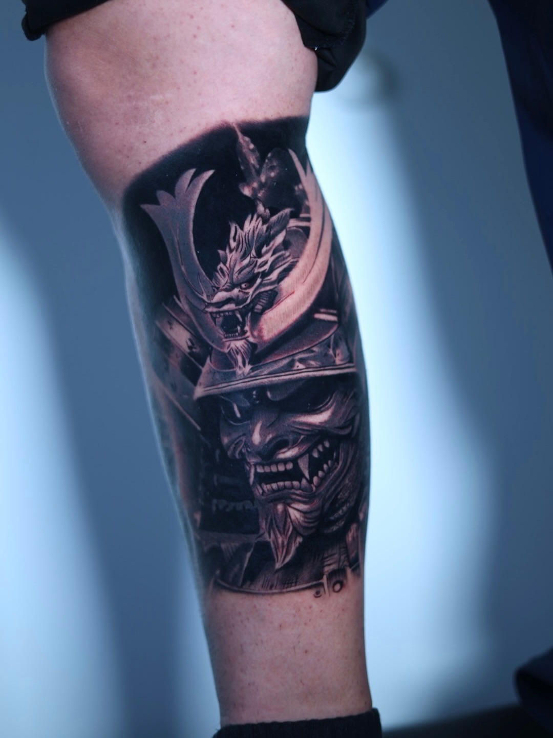Samurai helmet realism tattoo on the forearm by Tiago Ink