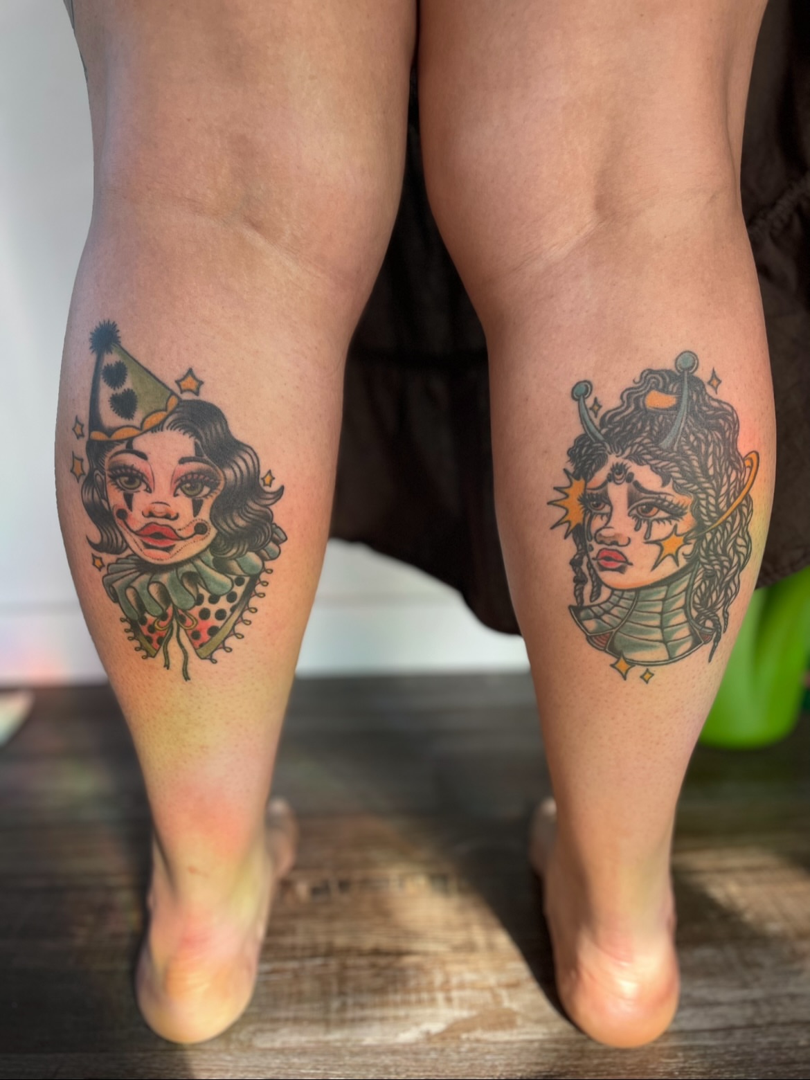 Clown and elf American traditional tattoo on the calf by Eryn, Portland, Oregon