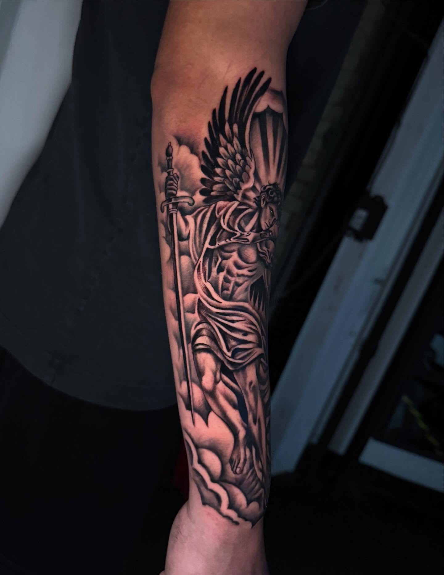Angelic warrior realism tattoo on the forearm by Daero Tattoo, New York, New York