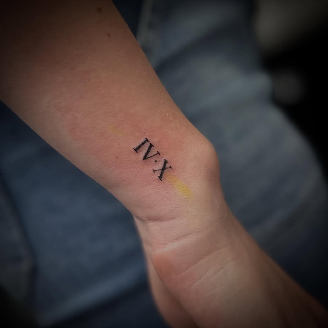 Tattoo by @izabella.tattoos — lettering_script, fine_line