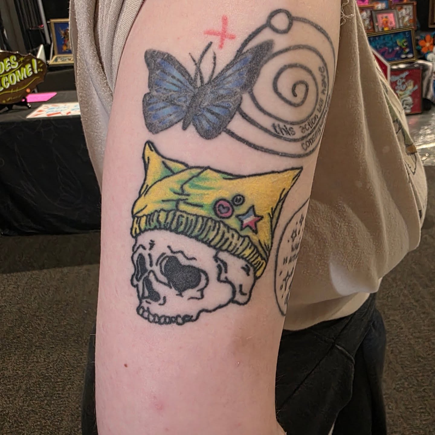Skull wearing hat new school tattoo on the forearm by K.F. Golden