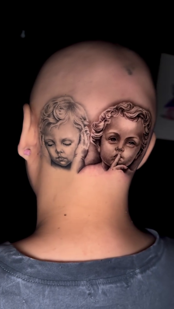 Cherub faces realism tattoo by Kaleb Trujillo