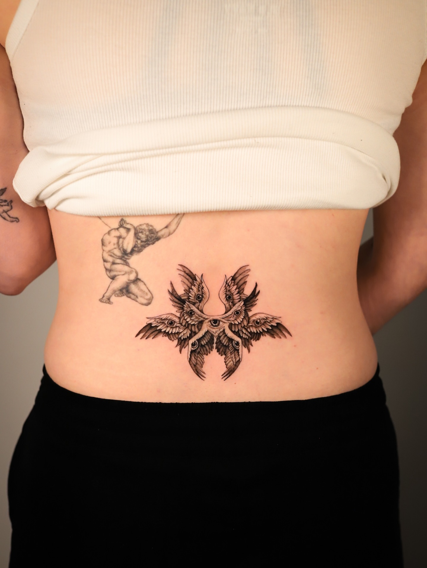 Mythical creature neo-traditional tattoo on the torso by Cyn