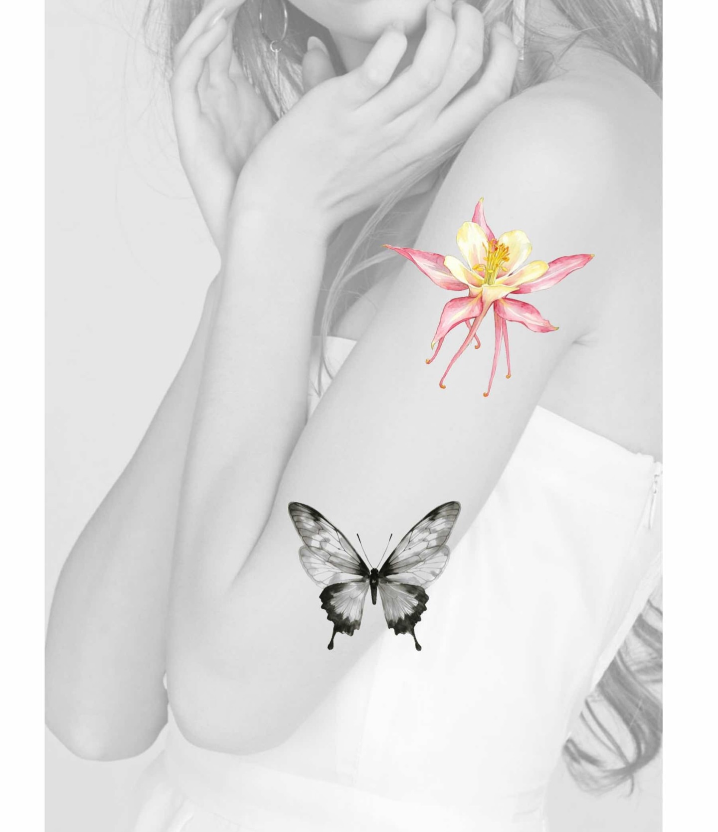 Flower and butterfly watercolor tattoo on the thigh by Xin Huang