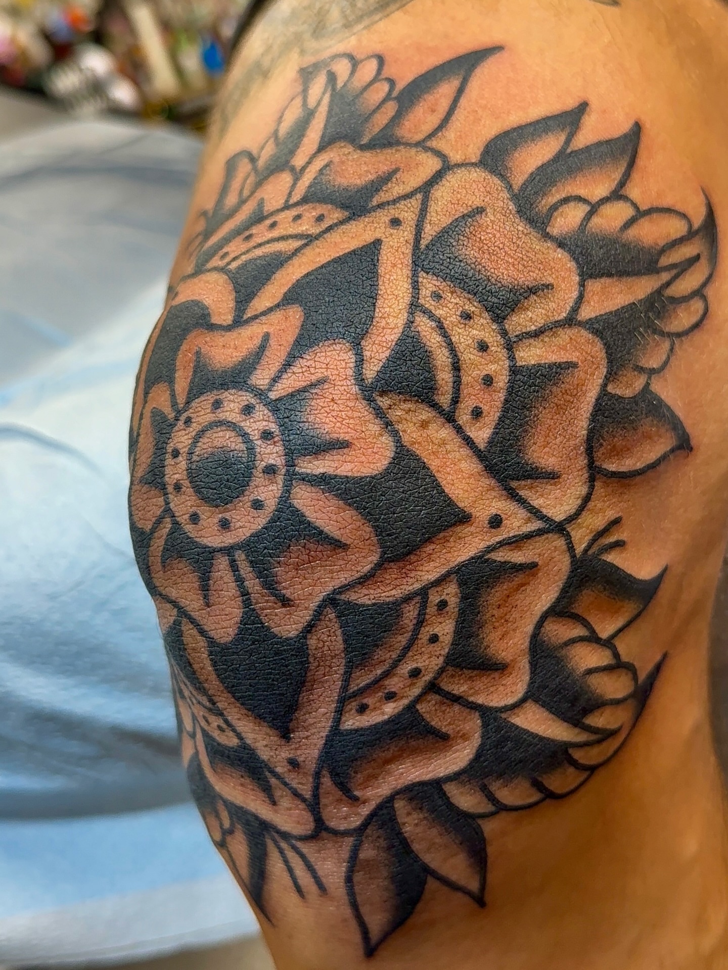 Floral design black and grey tattoo on the shoulder by VAY