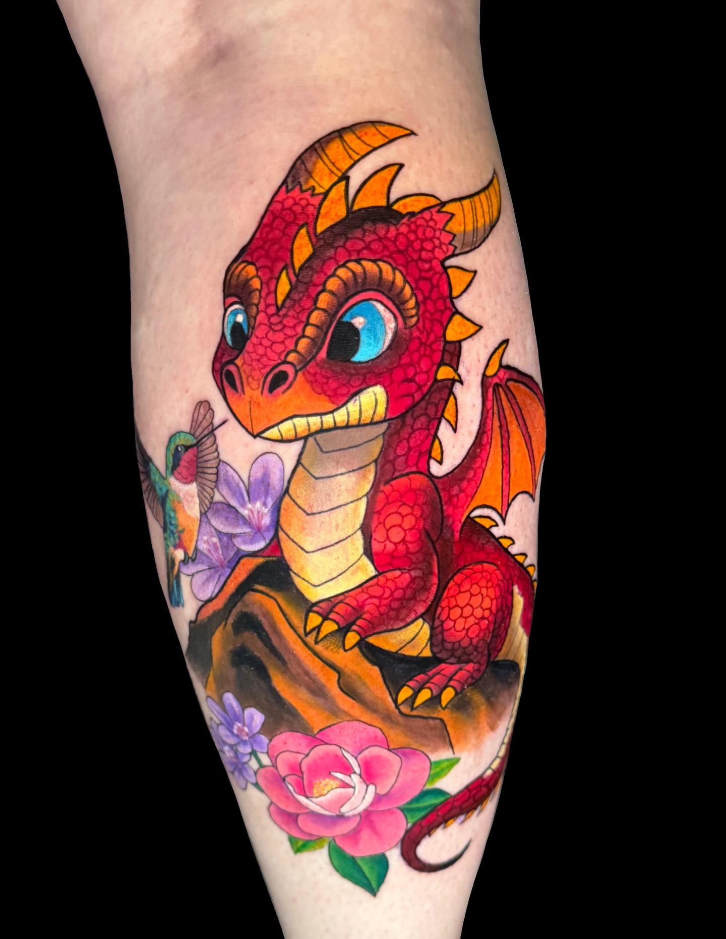 Dragon and flowers new school tattoo on the forearm by Jennifer Kovach, Gastonia, North Carolina