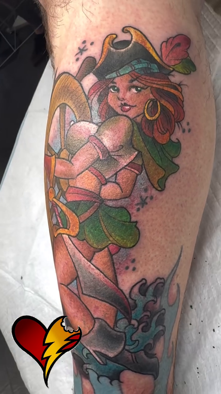 Pirate woman at ship's wheel American traditional tattoo by Joe Capobianco, New Haven, Connecticut