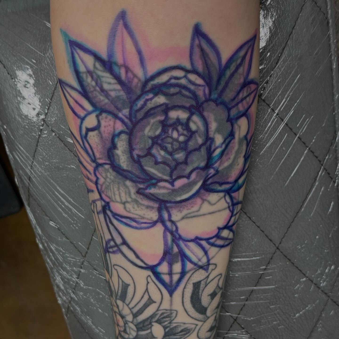 Peony American traditional tattoo on the forearm by Austin Tattoo Artist
