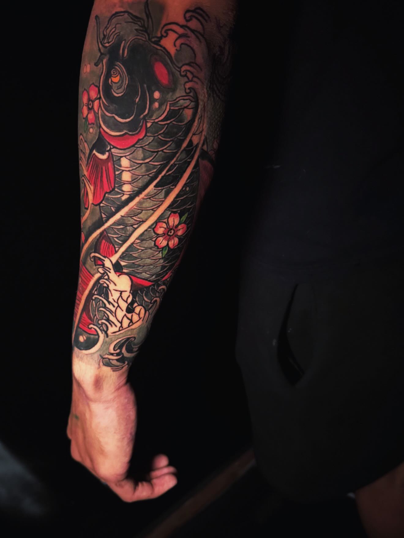 Koi fish japanese irezumi tattoo on the forearm by Anthony Washington, Atlanta, Georgia
