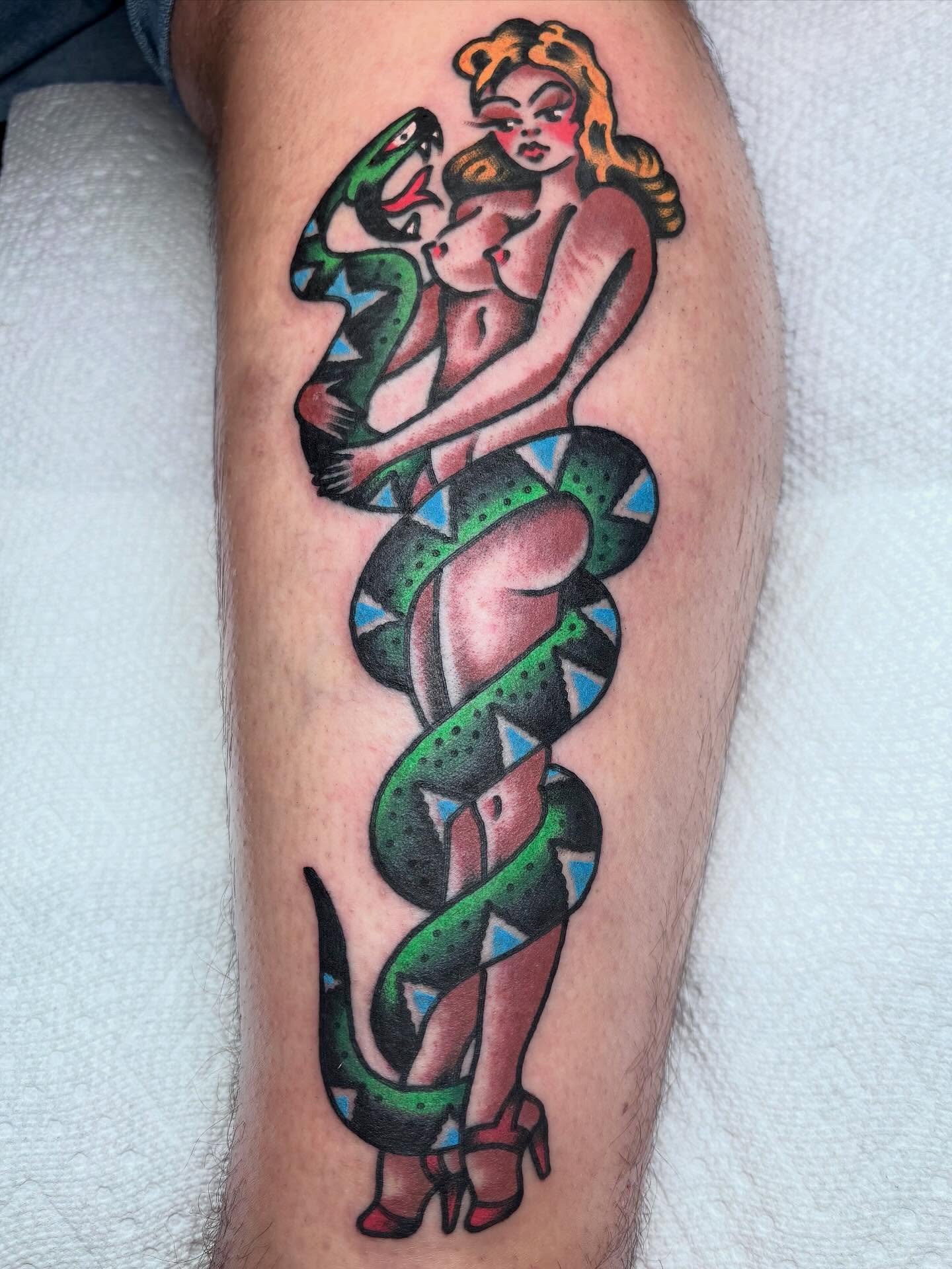 Snake and woman American traditional tattoo on the leg by ~pooty~