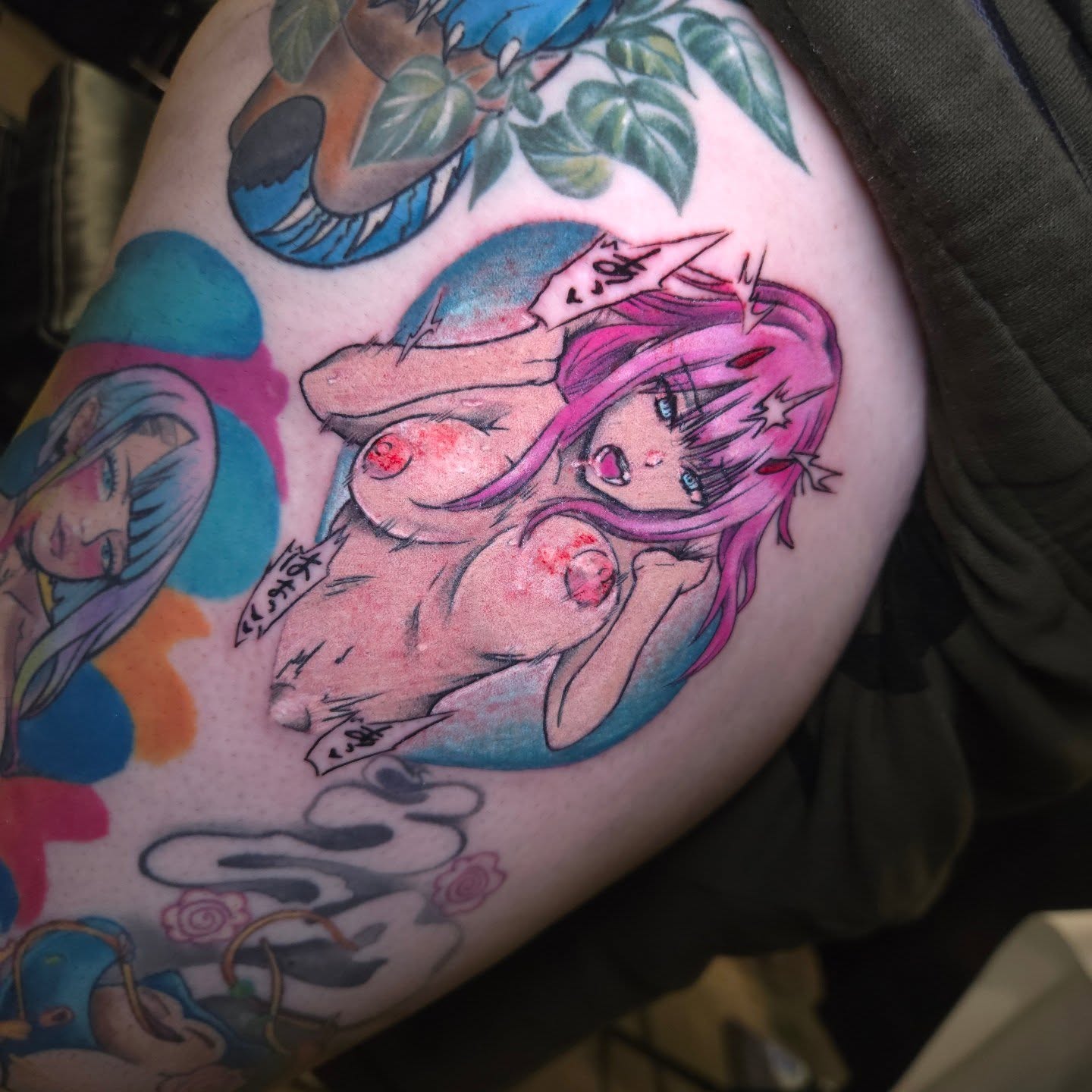 Anime character anime tattoo on the thigh by Nic Mann