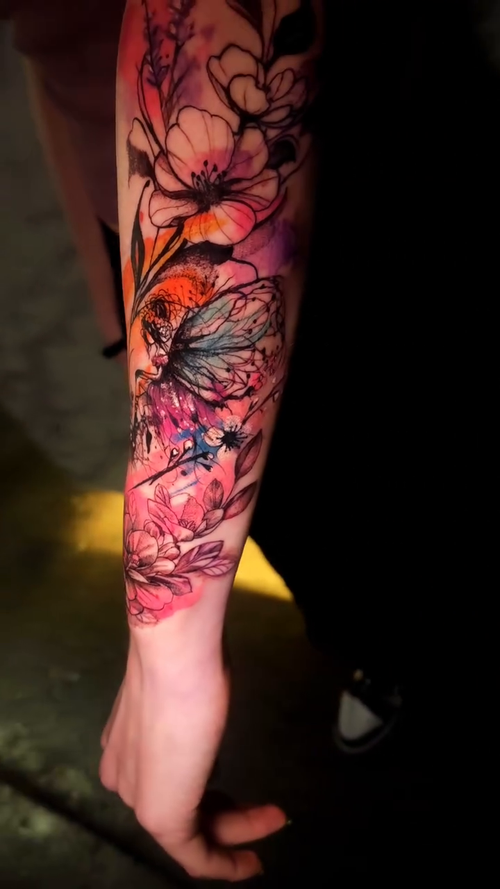 Butterfly and flowers watercolor tattoo by Xavier NYC TATTOO ARTIST