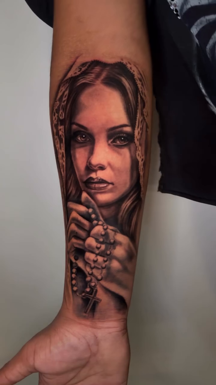Woman with rosary realism tattoo by inkzombi