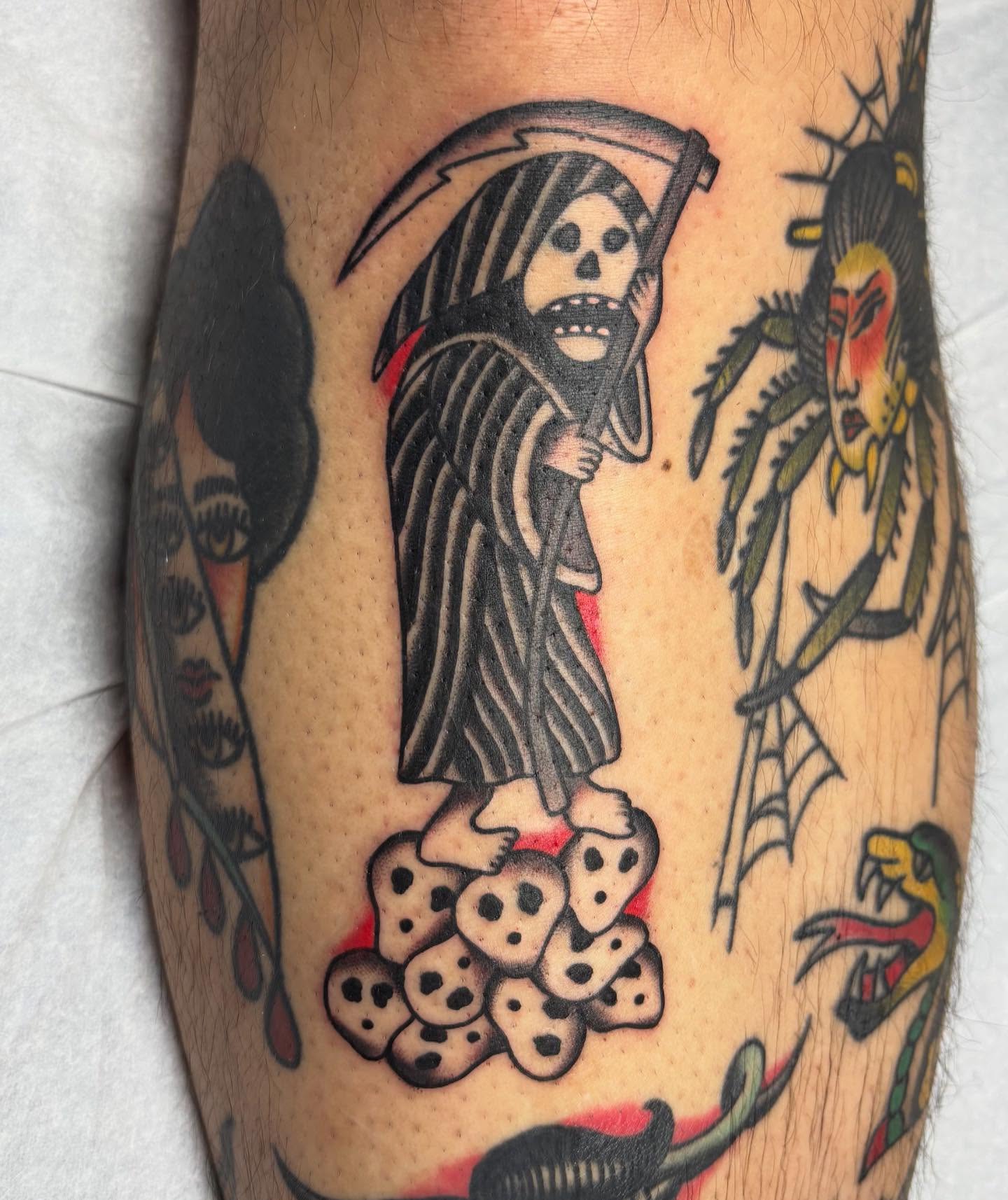 Grim reaper American traditional tattoo on the forearm by Izzy
