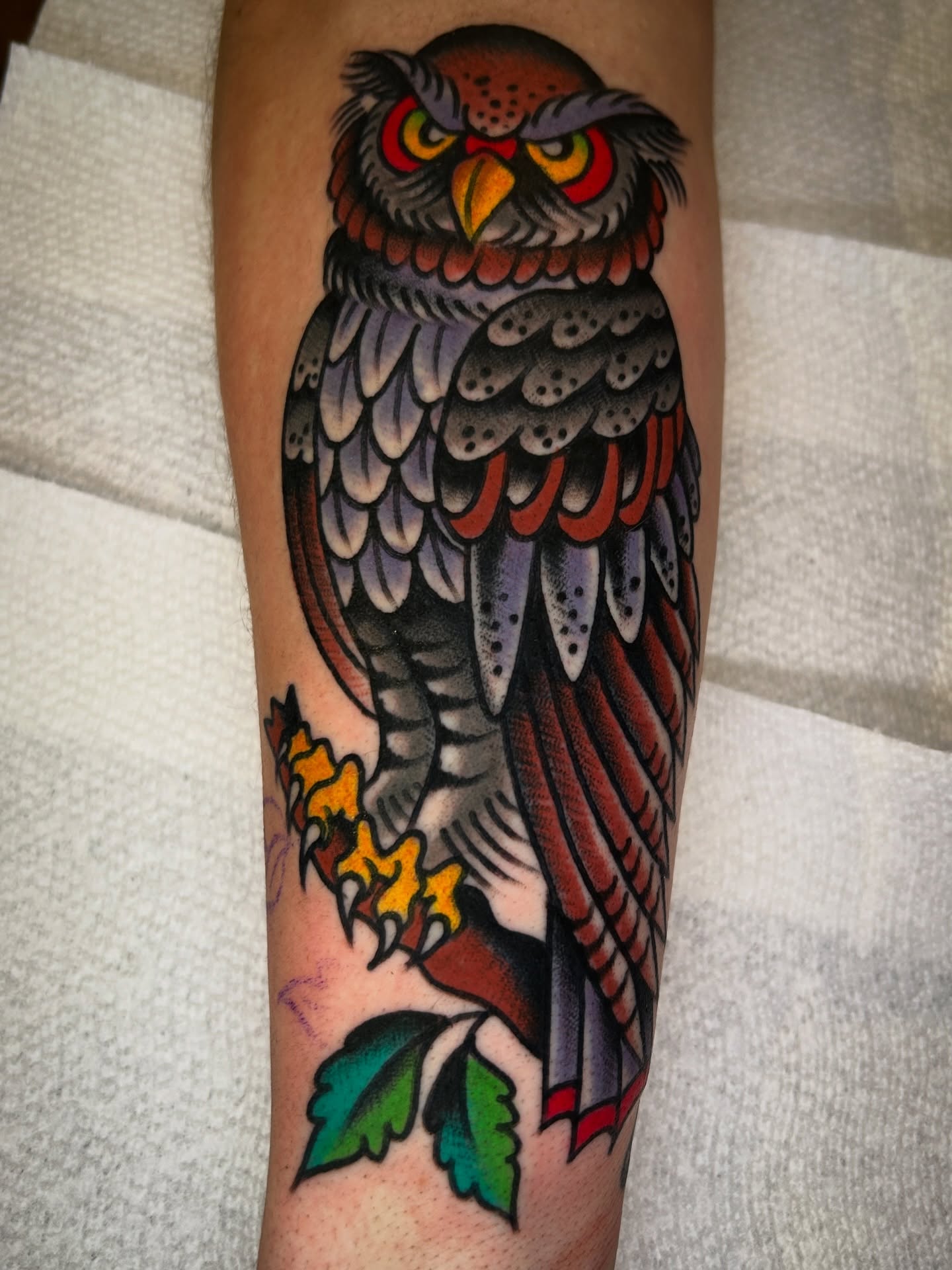 Owl American traditional tattoo on the forearm by Eric Caudill, Indianapolis, Indiana