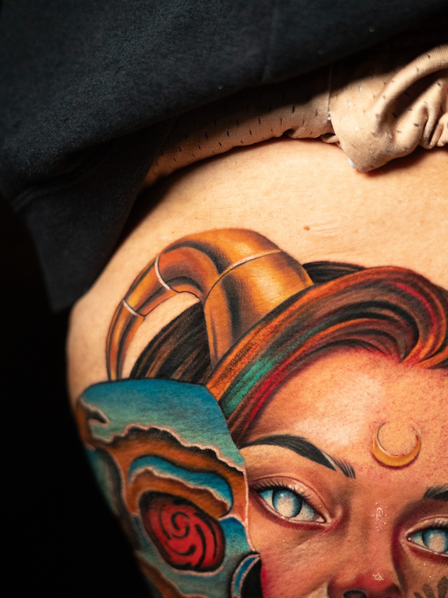 Woman's face American traditional tattoo on the torso by Tattoo Artist