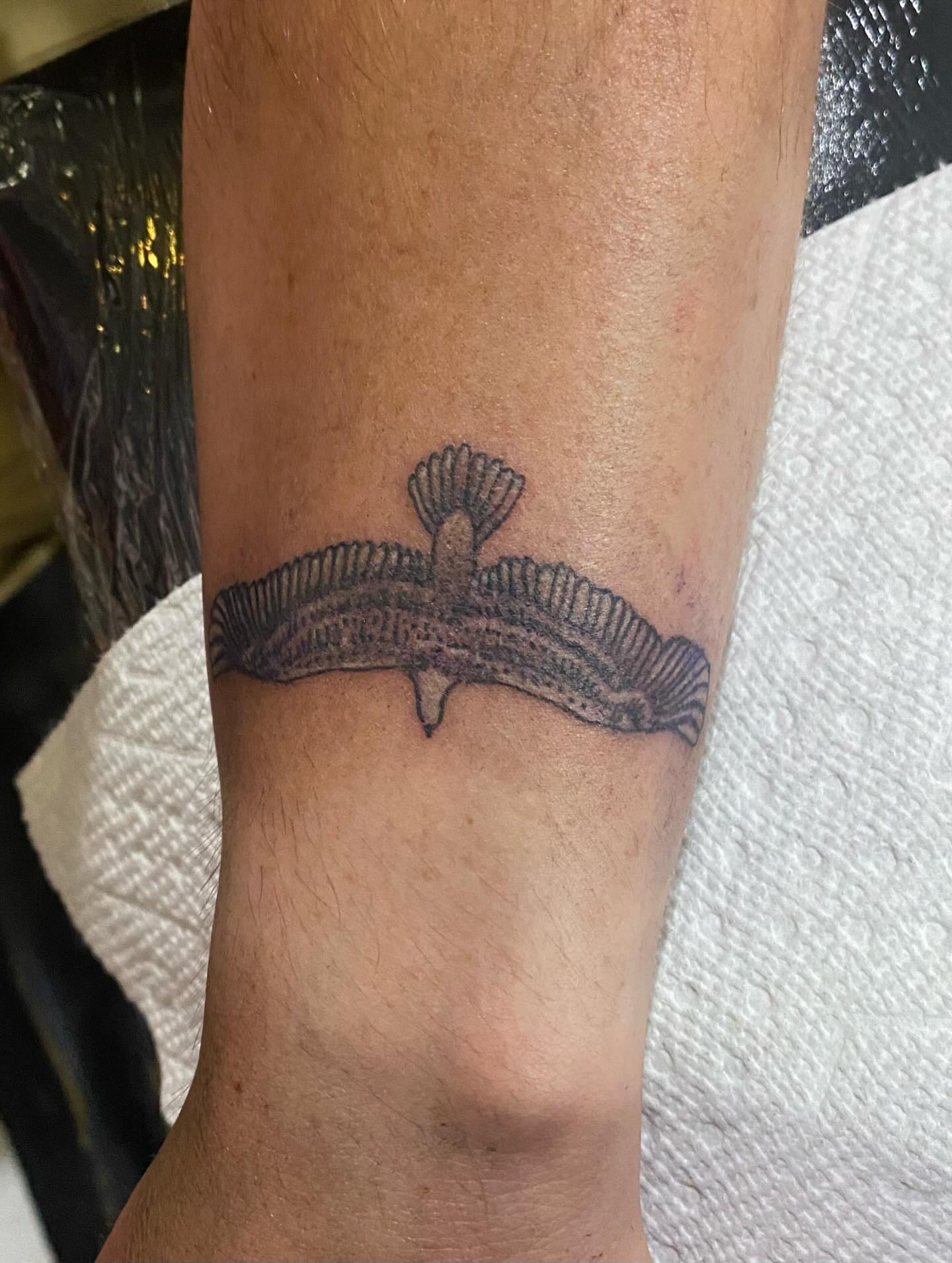 Tattoo by @melonmyerstattoos — black_and_grey