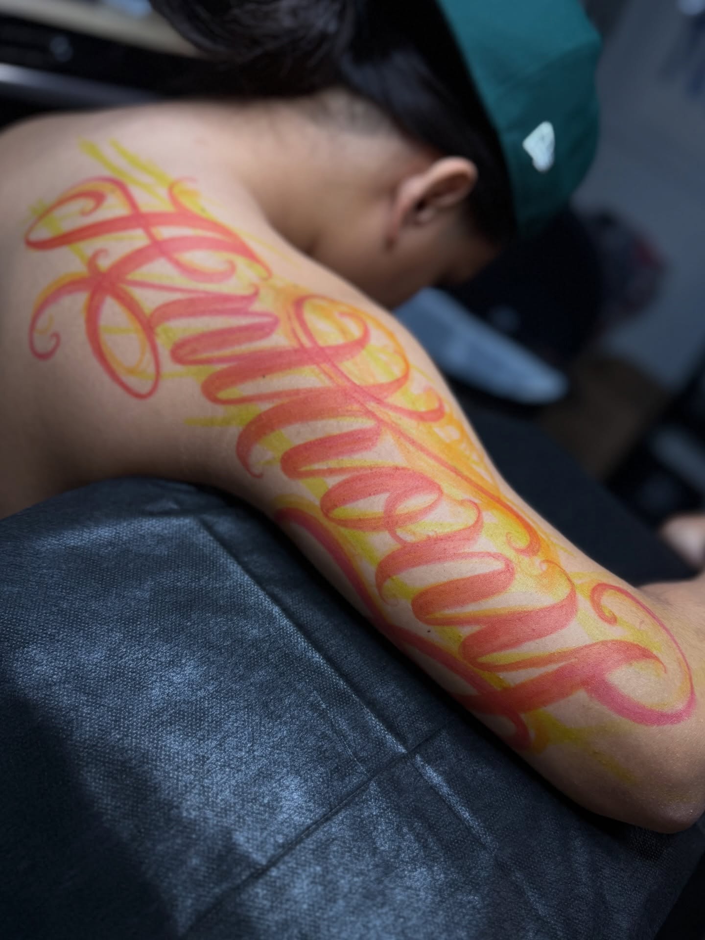 Script lettering lettering script tattoo on the back by Rocky G Inkz LLC