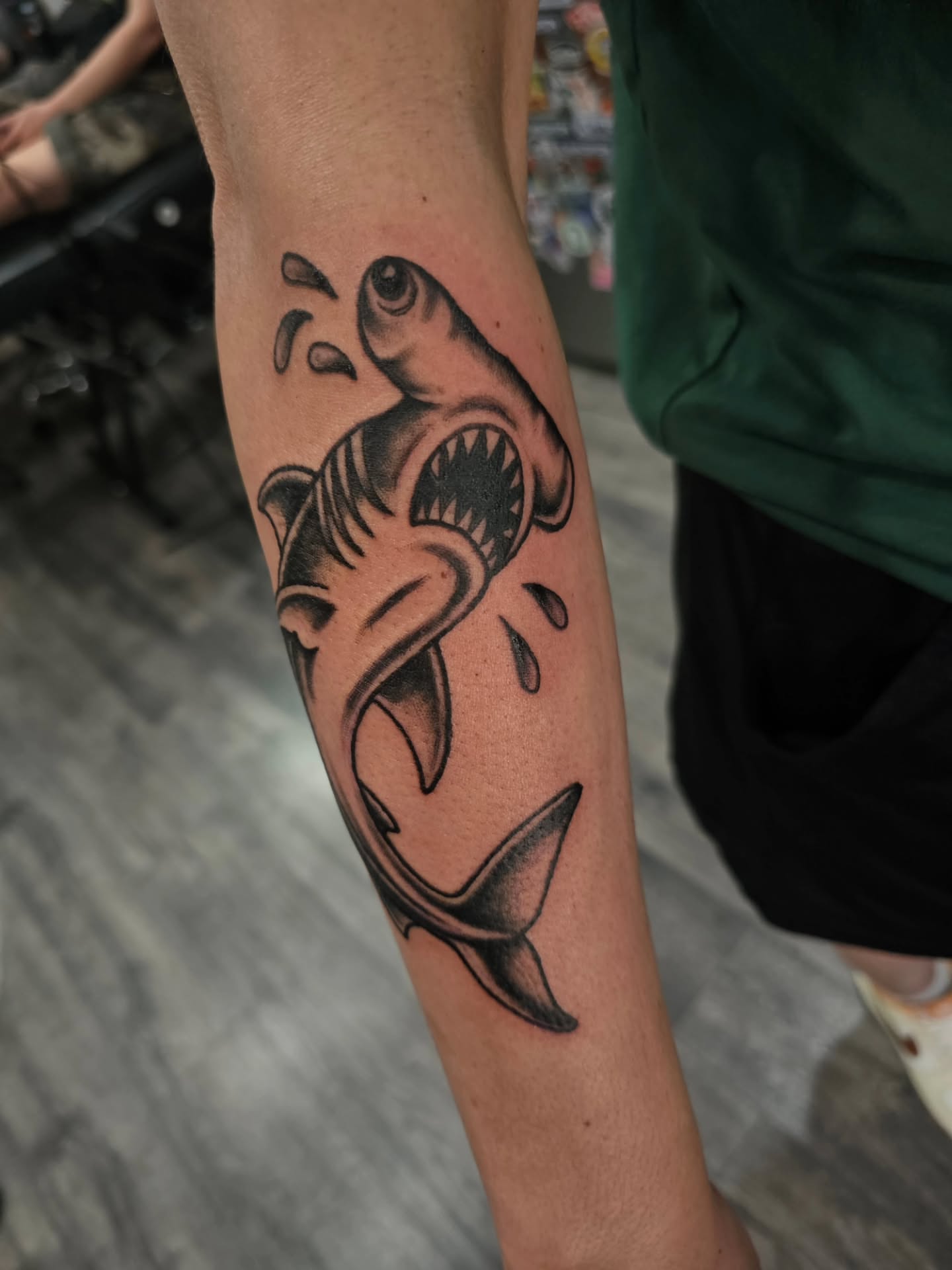 Shark black and grey tattoo on the forearm by Matthew Ashmore