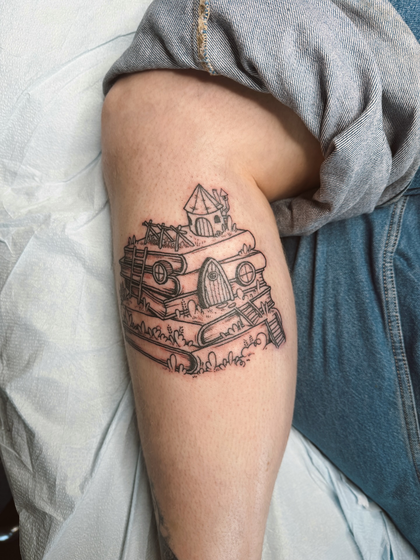 Houseboat black and grey tattoo on the forearm by Emma Berger