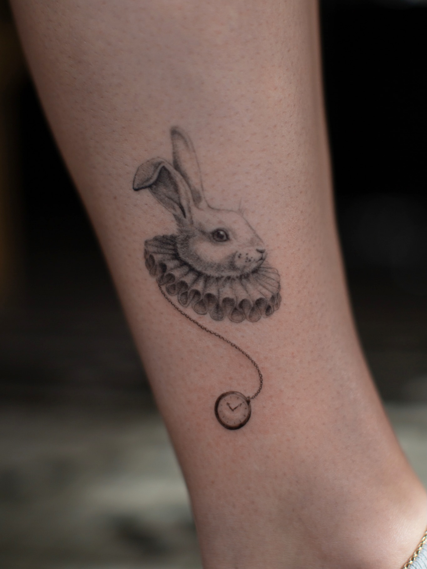 Rabbit realism tattoo on the forearm by Aries Rising