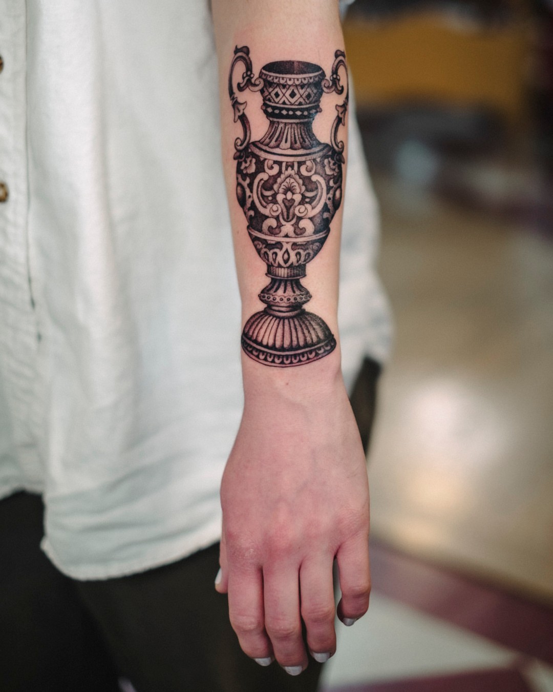 Vase black and grey tattoo on the forearm by Dan Gilsdorf, Portland, Oregon