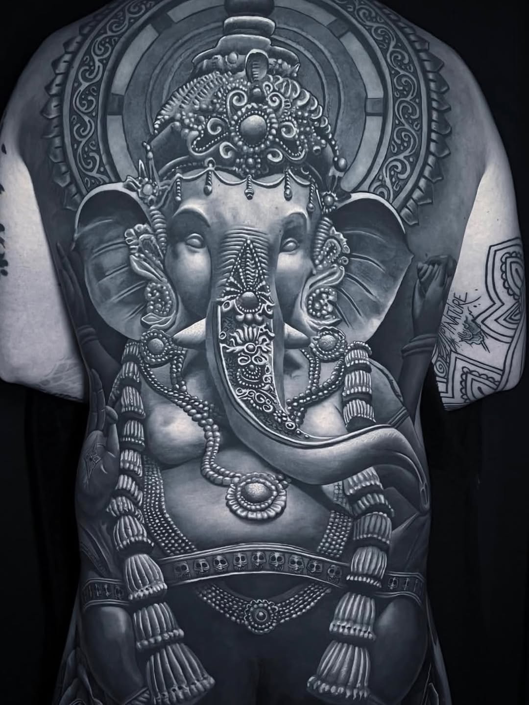 Ganesha realism tattoo on the back by Gabriel Londis